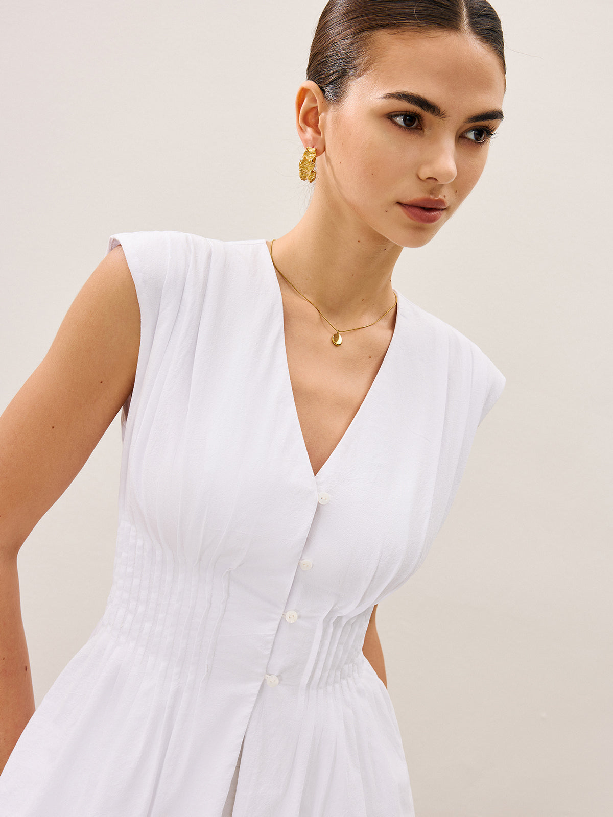 Pleated Peplum V-Neck Blouse